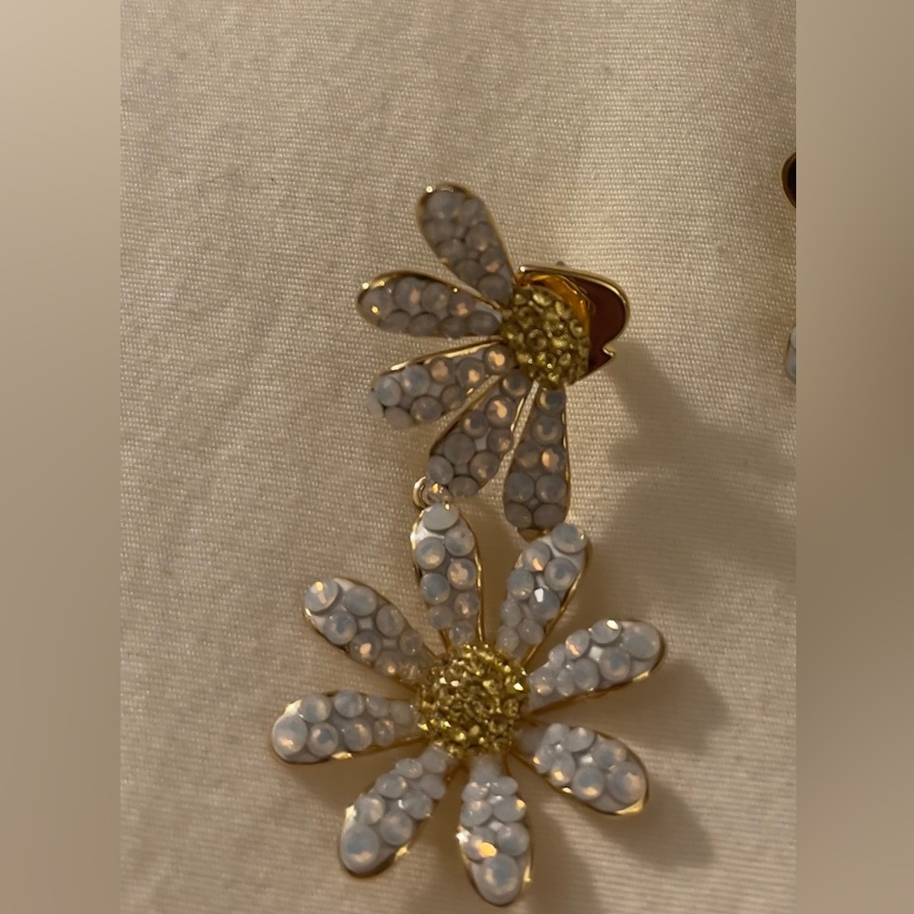 Gold tone crystal and stone flower left right earrings never worn.